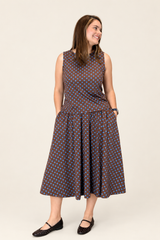 Conjunto Lisboa Saia Evasê com Bolsos e Blusa Decote Canoa Design Feminino Romântico em Malha Confort